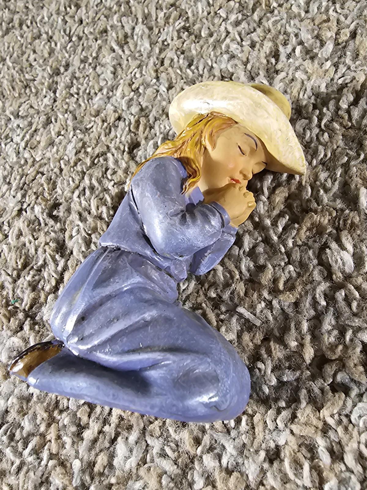 little cowgirl praying figurine Chipped