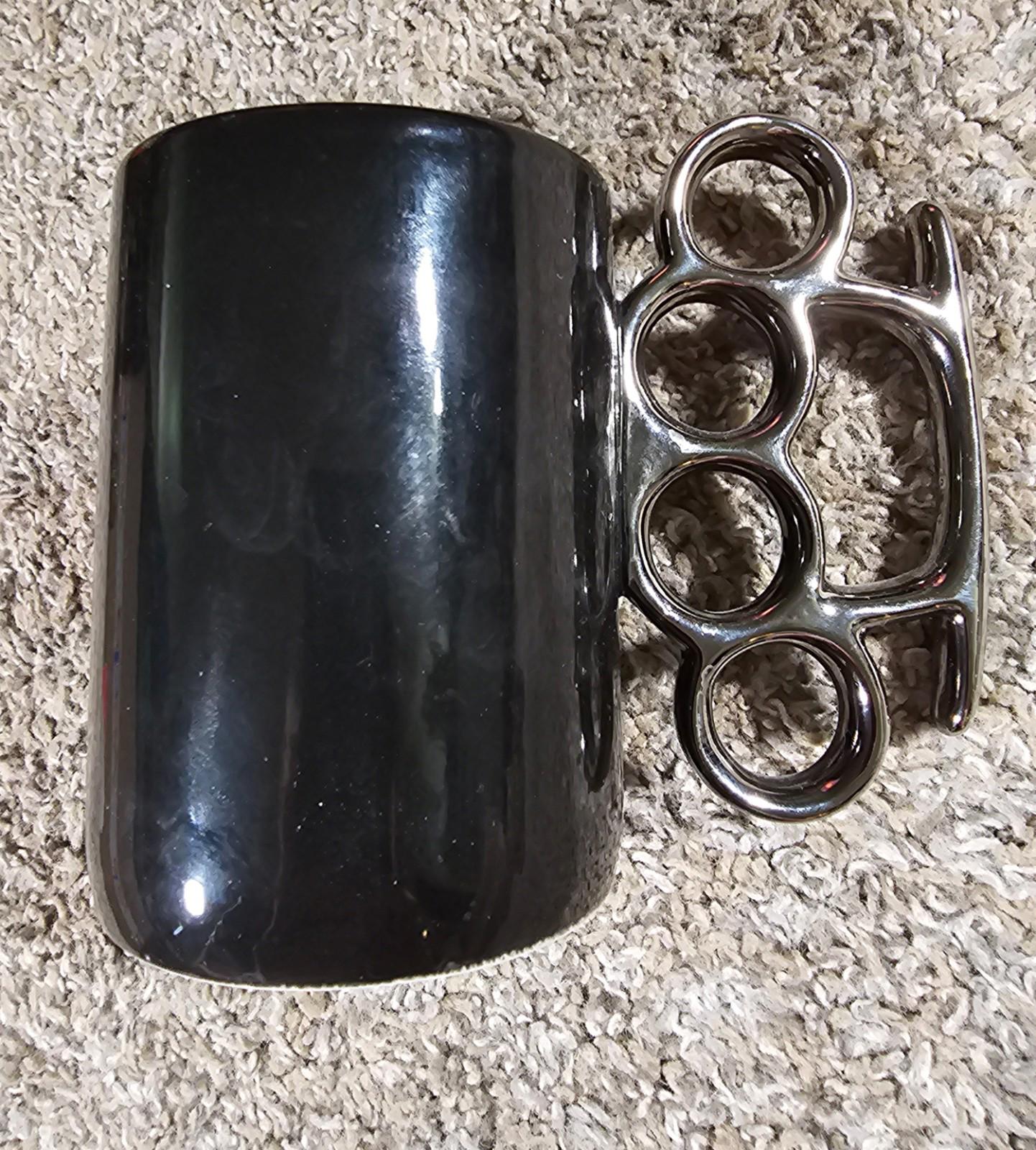 Just Funky brass knuckle coffee mug