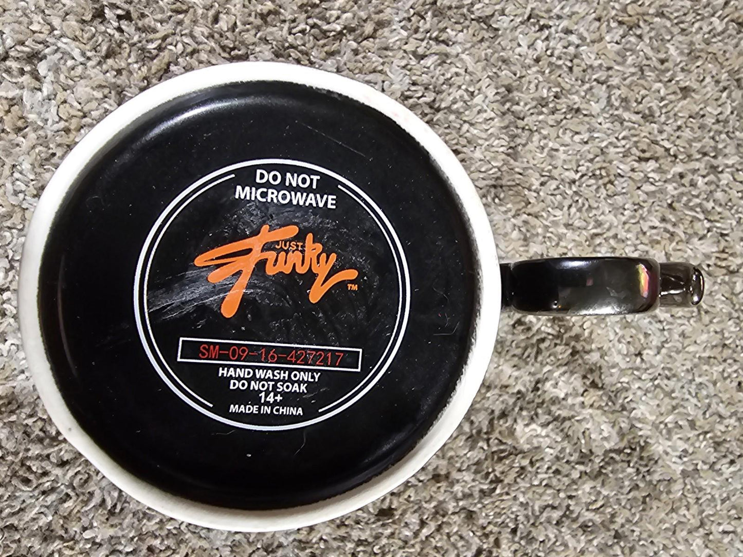 Just Funky brass knuckle coffee mug
