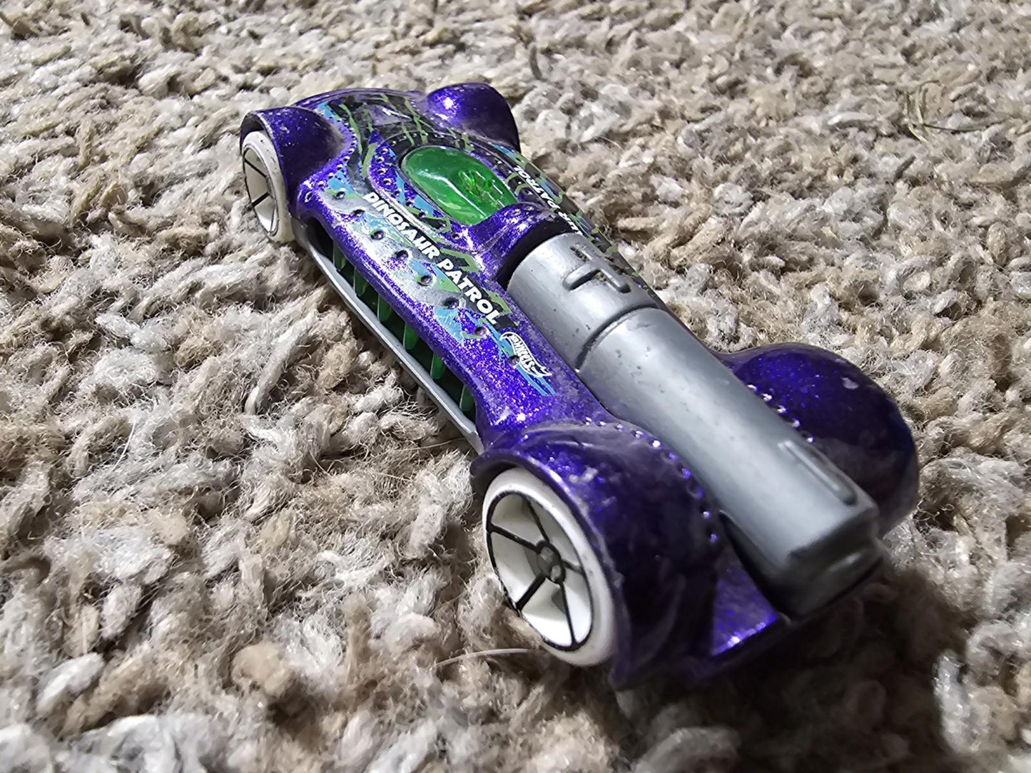 Hot Wheels Retro-Active 2010 Dinosaur Patrol Toy Car Vehicle Purple Green Mattel