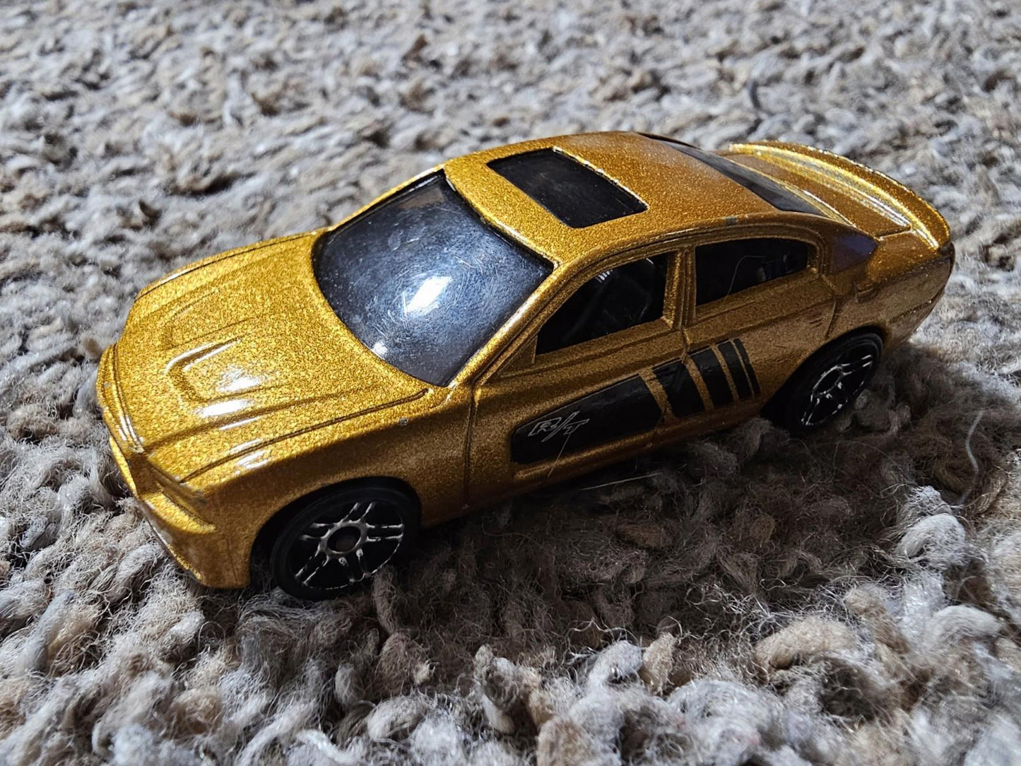 Mattel 2011 Chrysler group Dodge Charger RT toy car