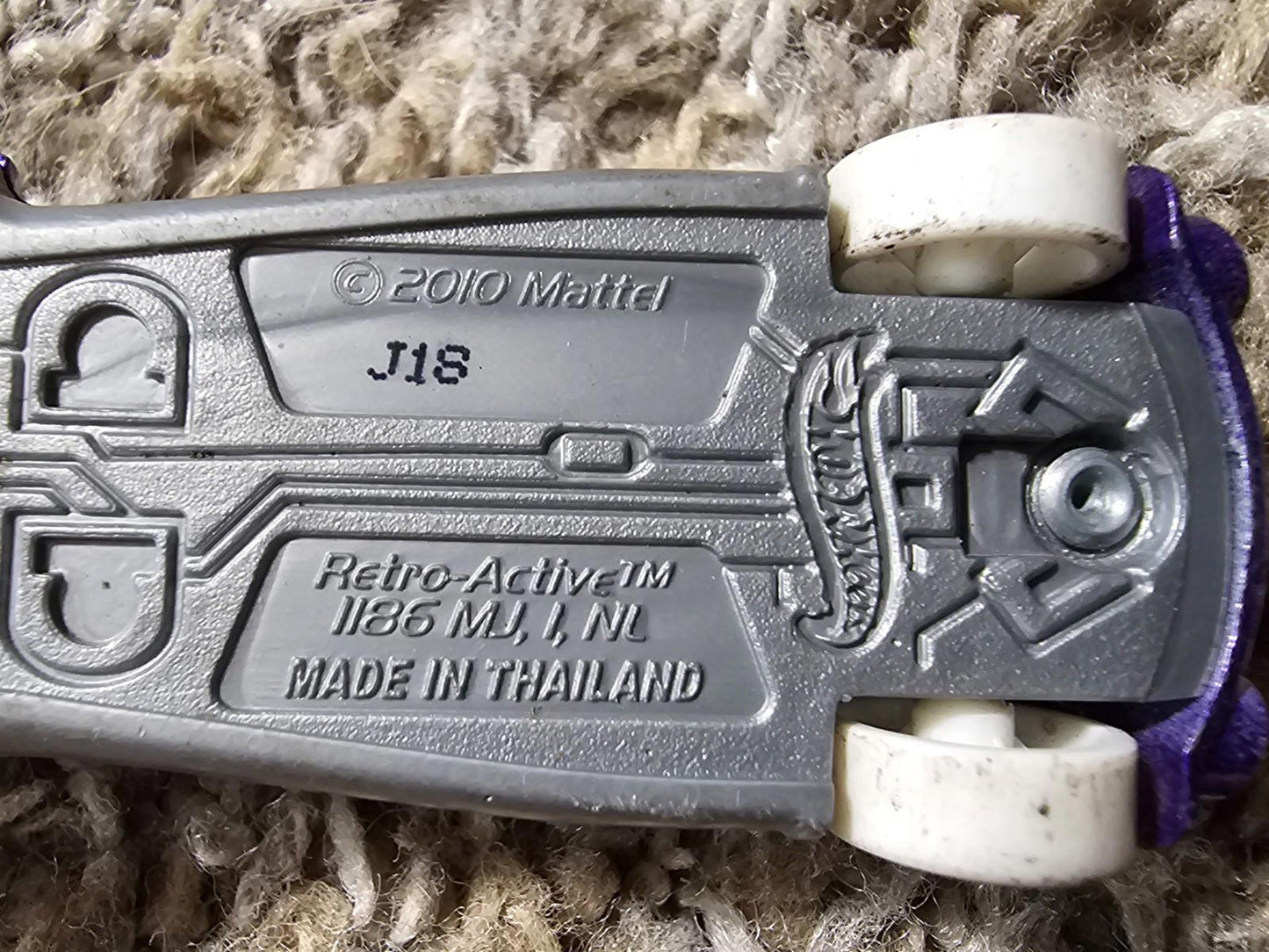 Hot Wheels Retro-Active 2010 Dinosaur Patrol Toy Car Vehicle Purple Green Mattel