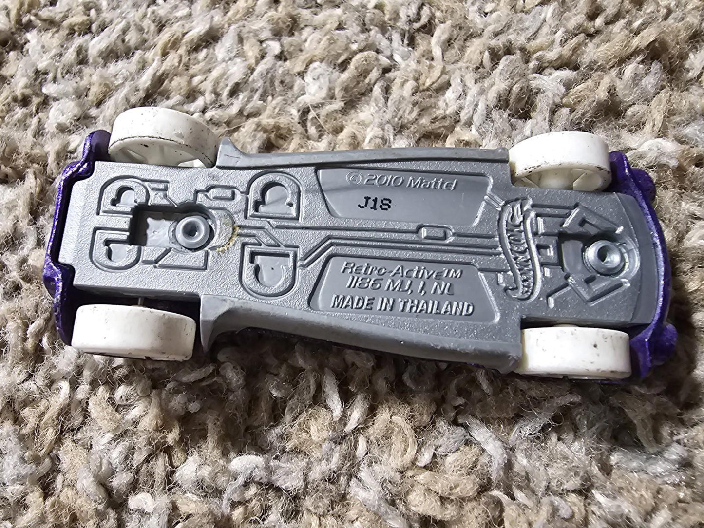 Hot Wheels Retro-Active 2010 Dinosaur Patrol Toy Car Vehicle Purple Green Mattel