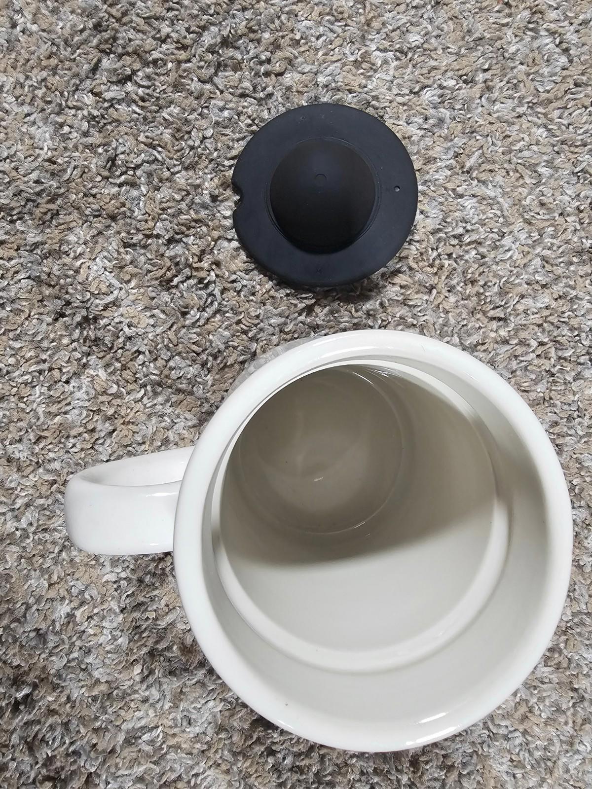 ceramic diner-style coffee mug with a black tribal-style graphic HEAVY