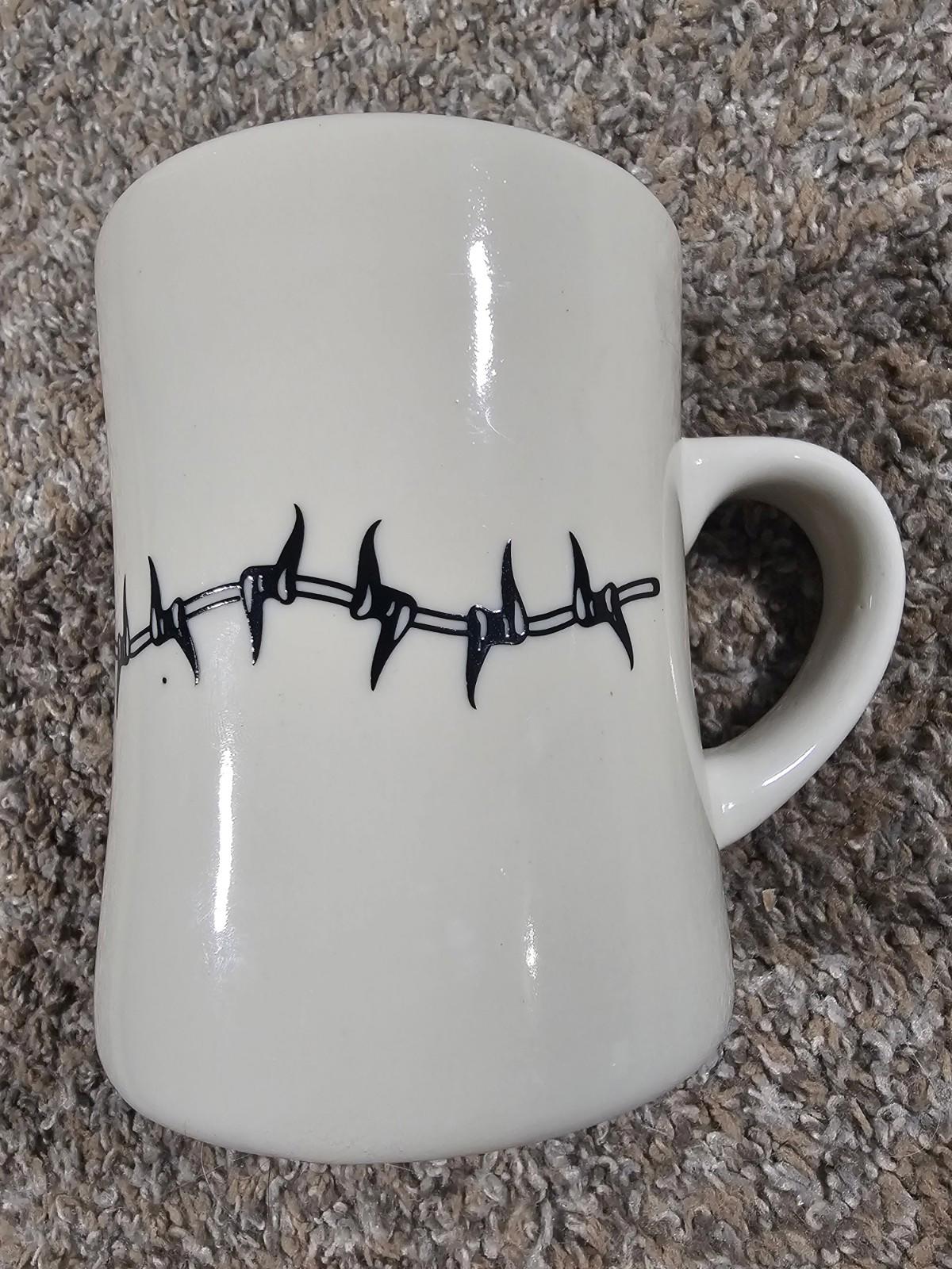 ceramic diner-style coffee mug with a black Barb Wire graphic HEAVY