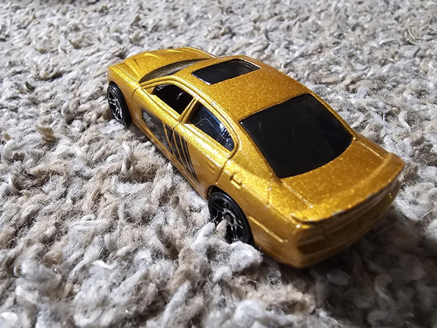 Mattel 2011 Chrysler group Dodge Charger RT toy car