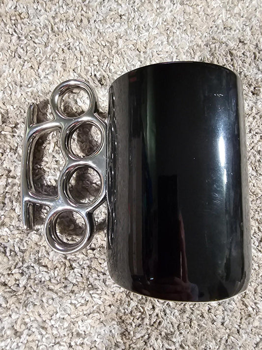 Just Funky brass knuckle coffee mug