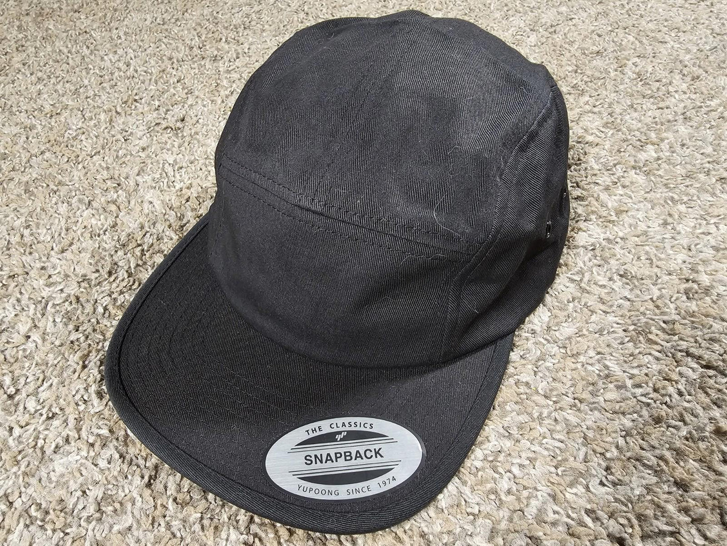 The Classics Yupoong Strapback Panel Hat Black