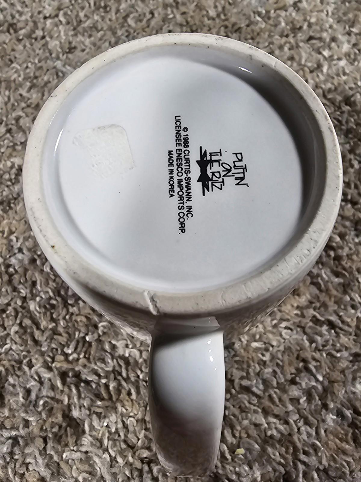 1986 puttin on the ritz coffee mug
