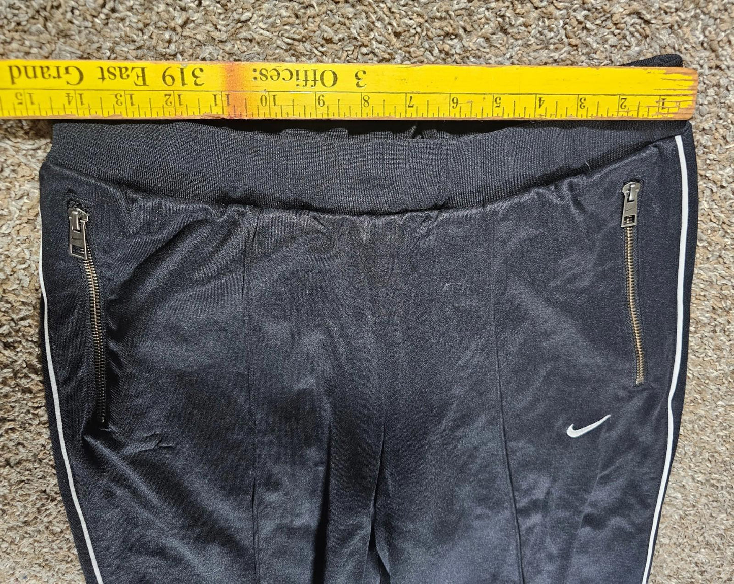 Nike Large athletic pants sewn in creases zippered pockets