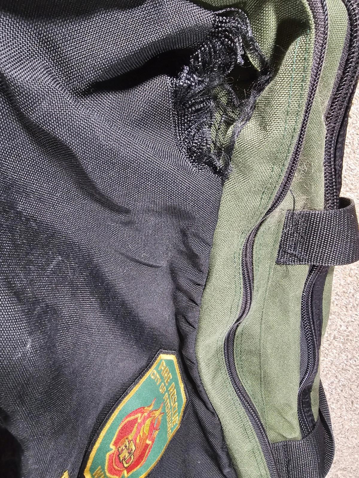 Fire Rescue City Of Fitchburg ENGINE 1 green duffle DAMAGED