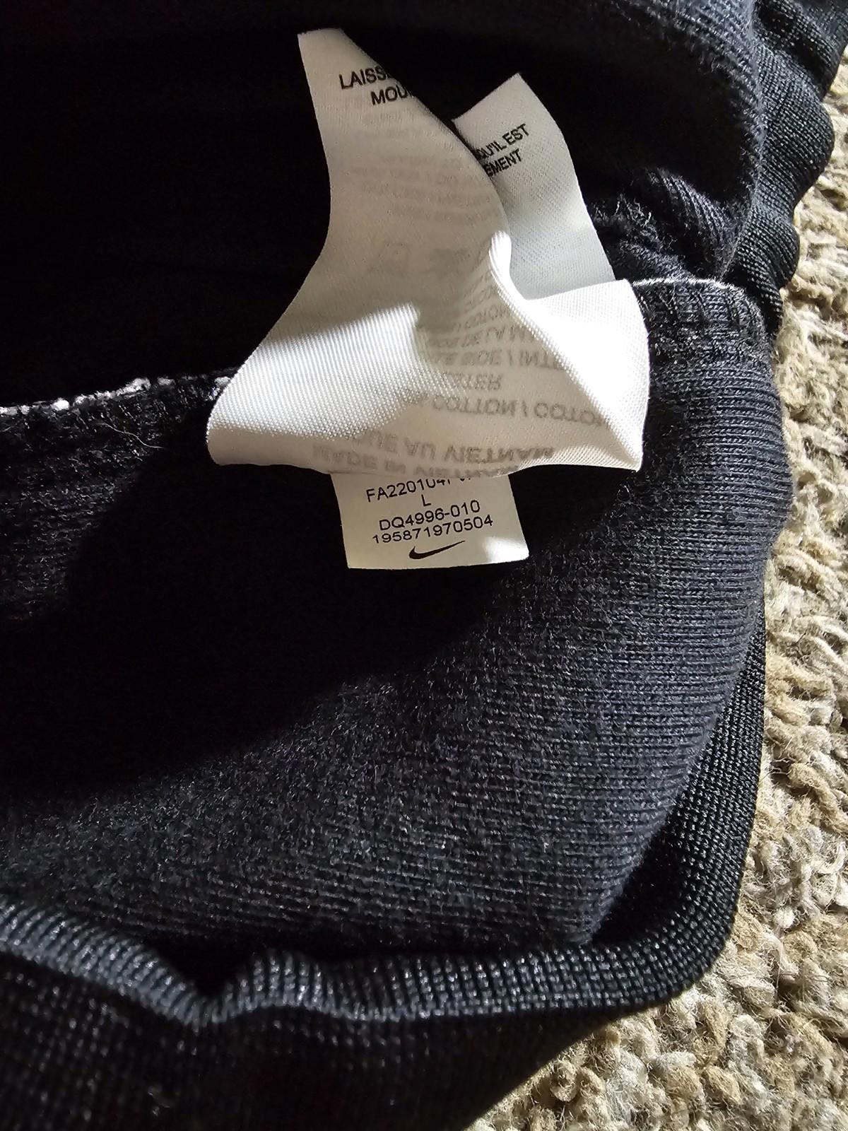 Nike Large athletic pants sewn in creases zippered pockets