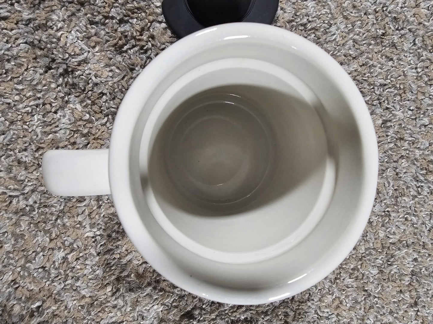 ceramic diner-style coffee mug with a black tribal-style graphic HEAVY