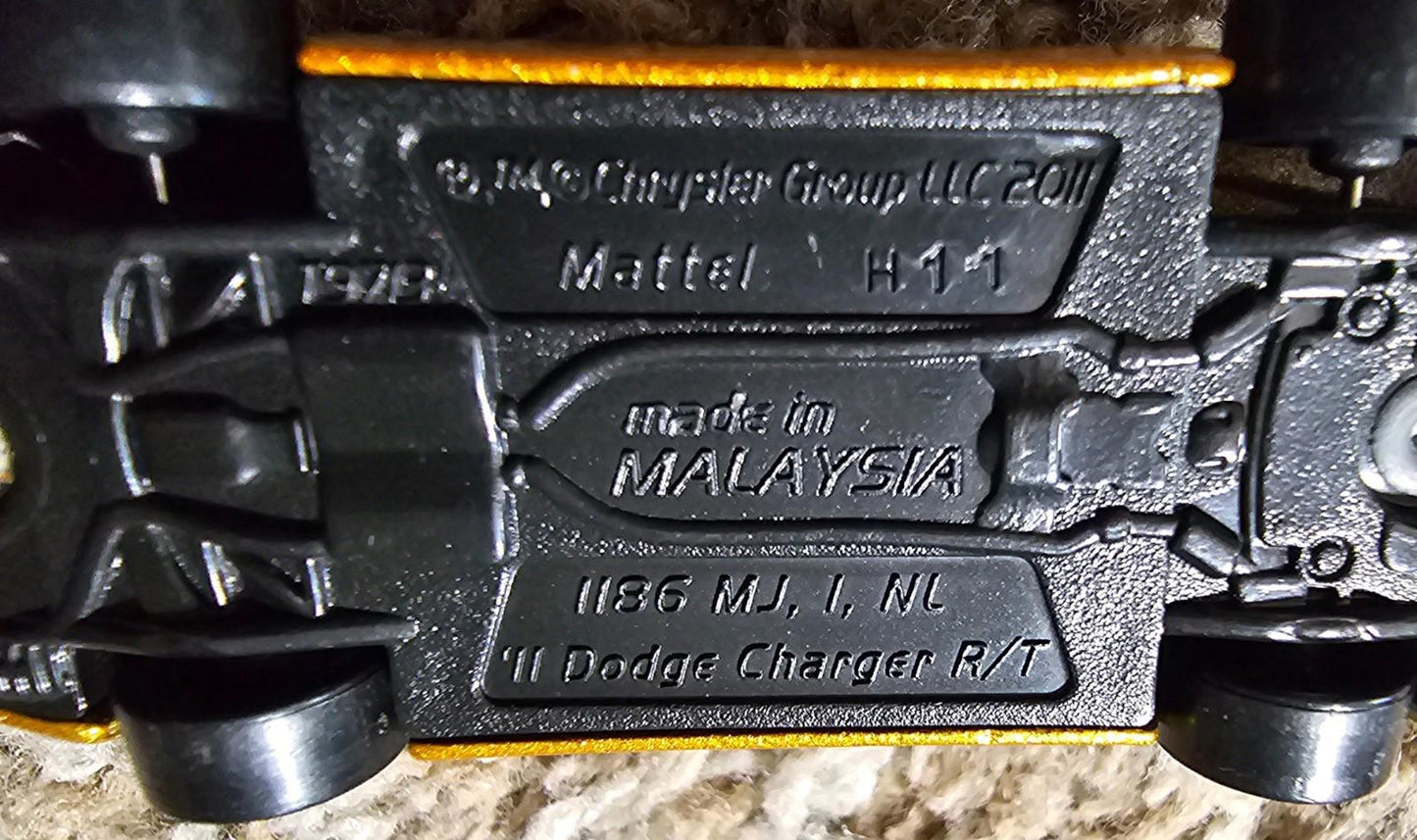 Mattel 2011 Chrysler group Dodge Charger RT toy car