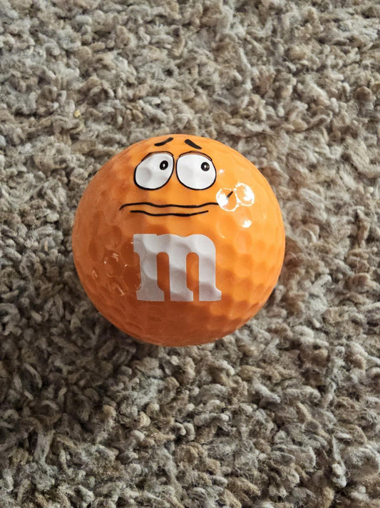 Orange Worried M&M Logo Used Golf Ball  - 1ct (one)