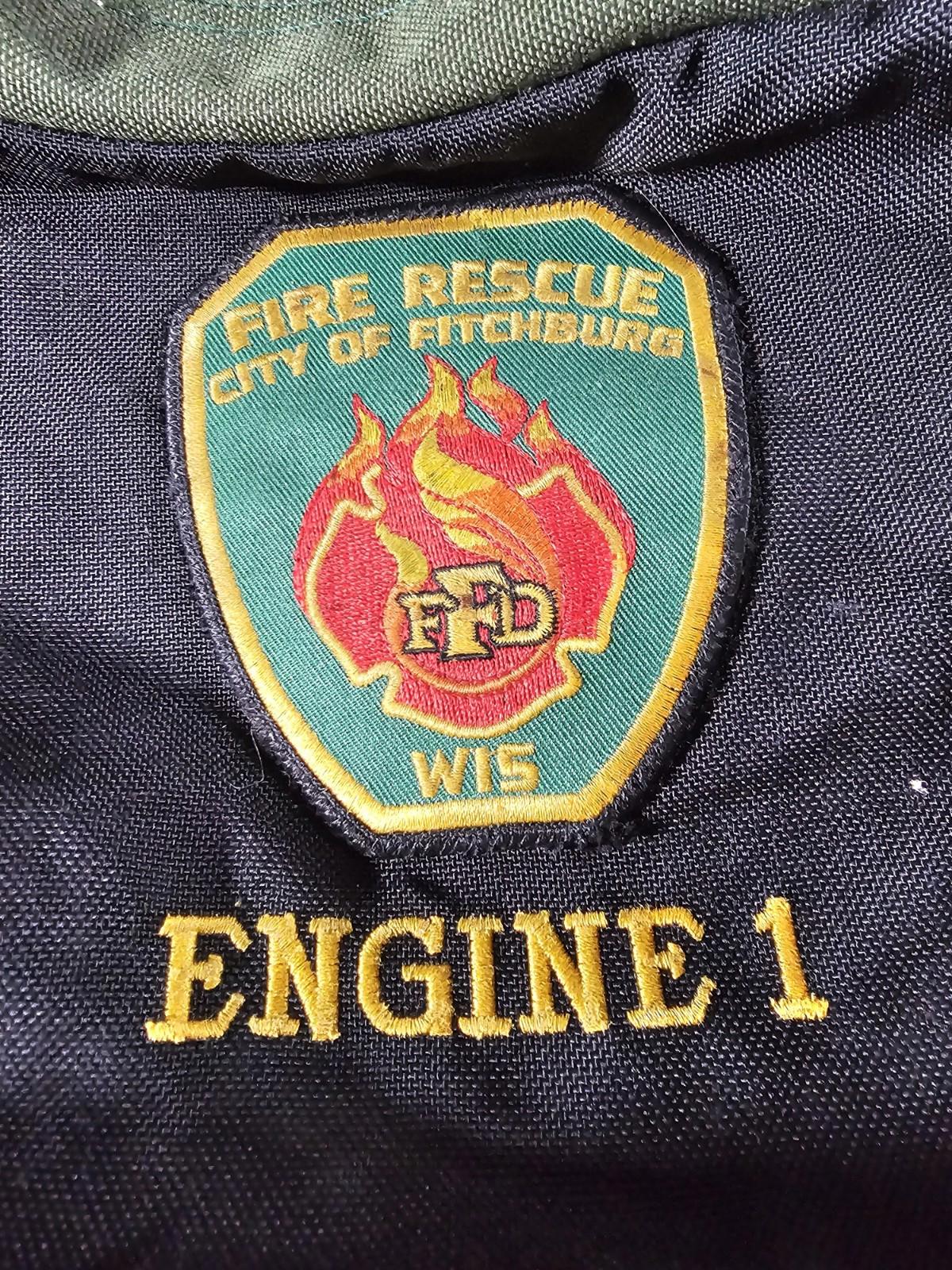 Fire Rescue City Of Fitchburg ENGINE 1 green duffle DAMAGED