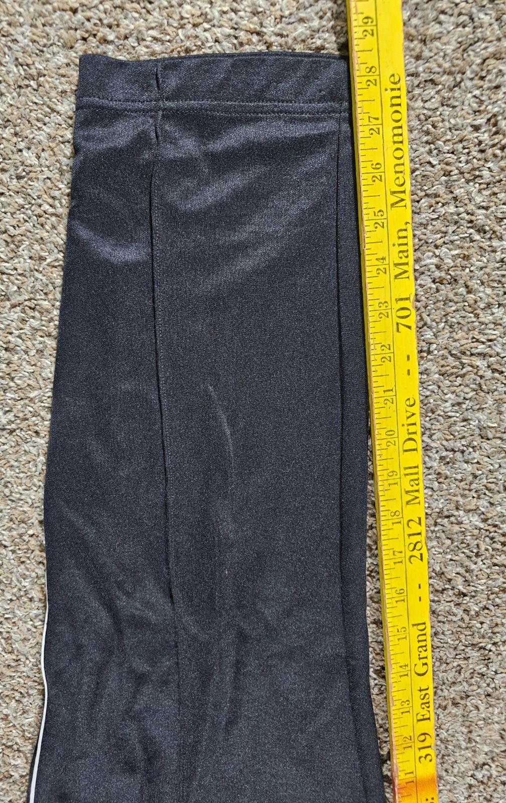 Nike Large athletic pants sewn in creases zippered pockets